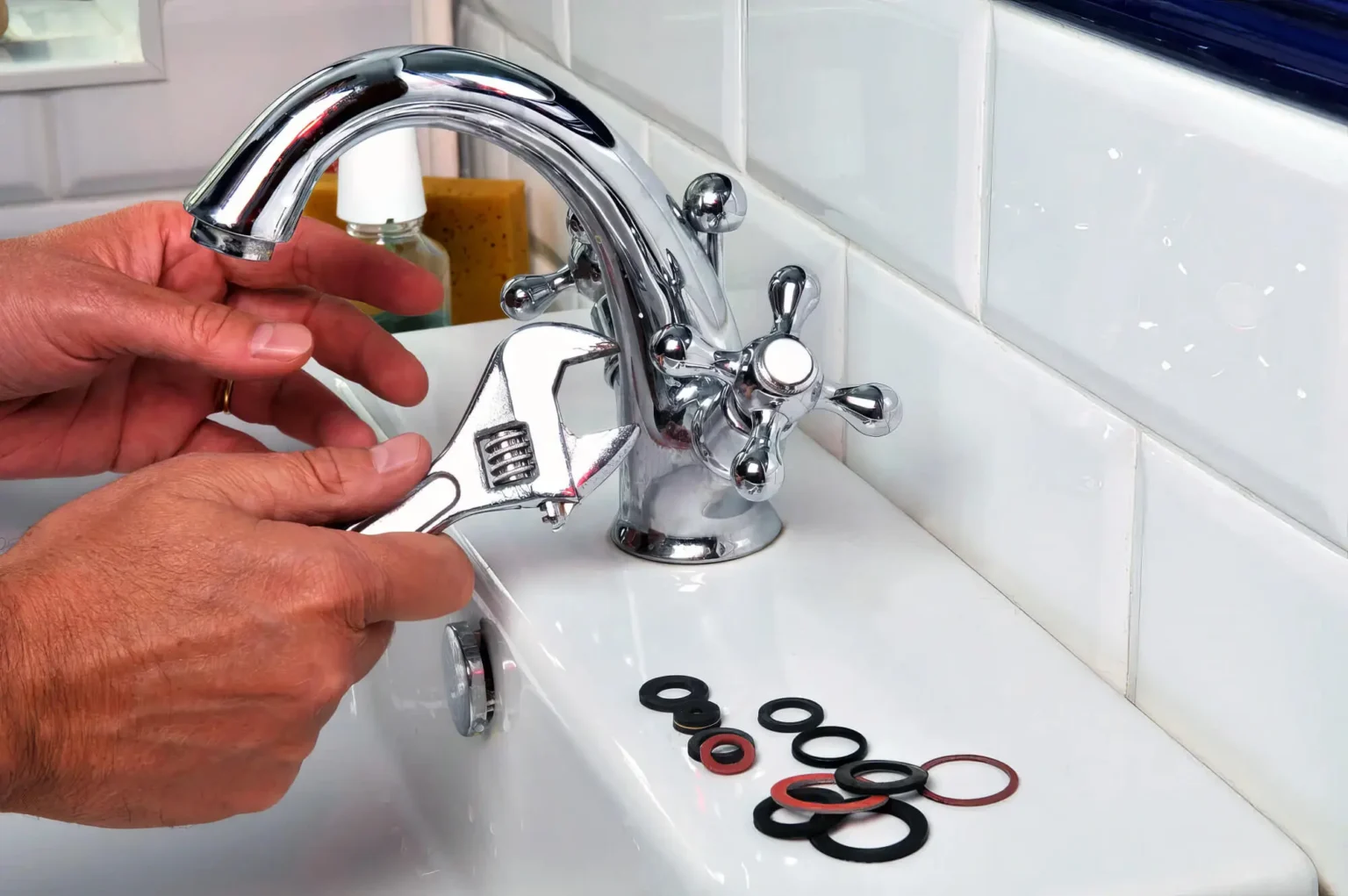 Plumber maintaining a bathroom faucet in Culver City